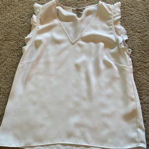 White sleeveless blouse